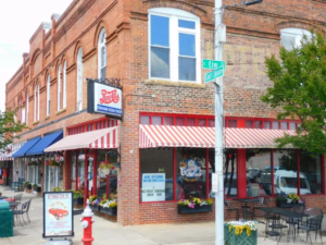 A picture of several businesses in downtown Graham, with Graham Soda Shop being most prominent
