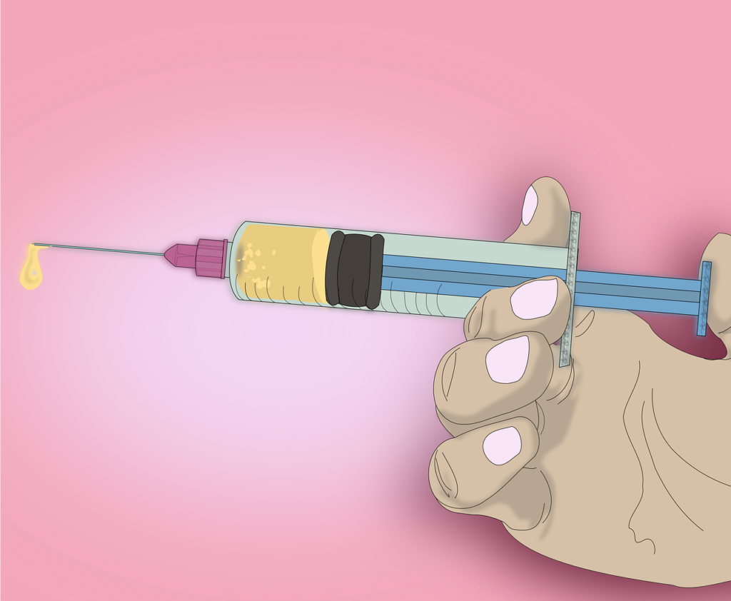 Hands giving a vaccine with pink background