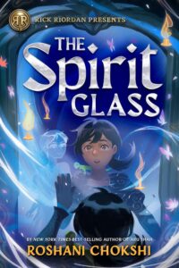 Cover of The Spirit Glass. Young woman looking at mirror, sees a ghost in the mirror.