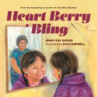 Cover of Heart Berry Bling. Young girl smiling in mirror, admiring her new earrings. Grandmother is standing behind her in a doorway.