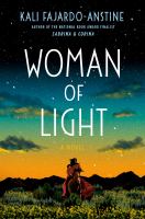 Cover of Woman of Light. Woman standing in front of mountains in background, sunset behind her with beautiful colors and clouds.