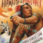 Cover of Hiawatha and the Peacemaker. Cover is dominated by Native American with paddle,, feather headdress and beaded bands. Behind him is the Peacemaker - white painted skin, with purple handprints, black eye, and feather headdress.