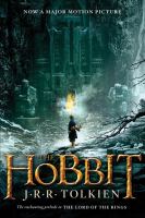 Cover of The Hobbit. A Hobbit in a desolate landscape, in front of a giant door.