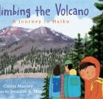 Cover of Climbing the Volcano. Young man standing and looking towards reader, wearing a backpack, and following his parents. Background has trees, lake and a mountain.