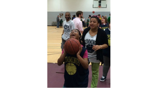 photo of Special Olympics Athlete shooting hoops
