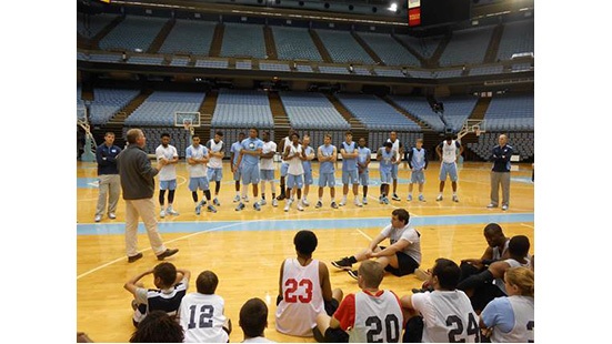 photo of SOAC athletes with UNC CH basketball team