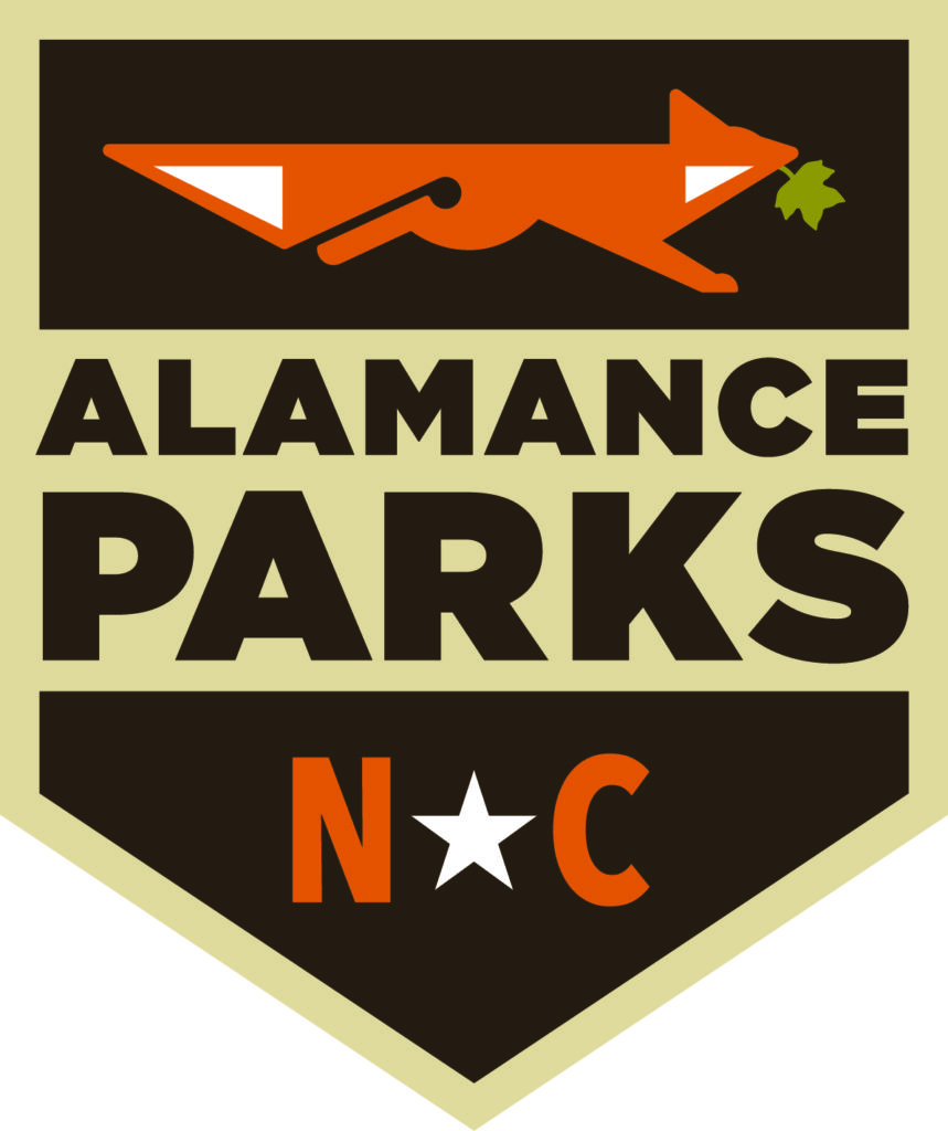 Alamance Parks Badge logo. The logo contains an orange fox at the top and the words "Alamance Parks NC".