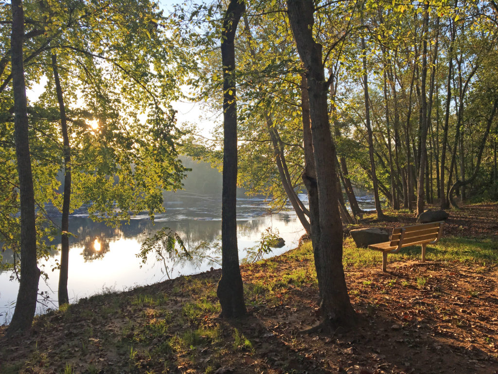 View of sunset on the banks of the Haw River at Swepsonville River Park.