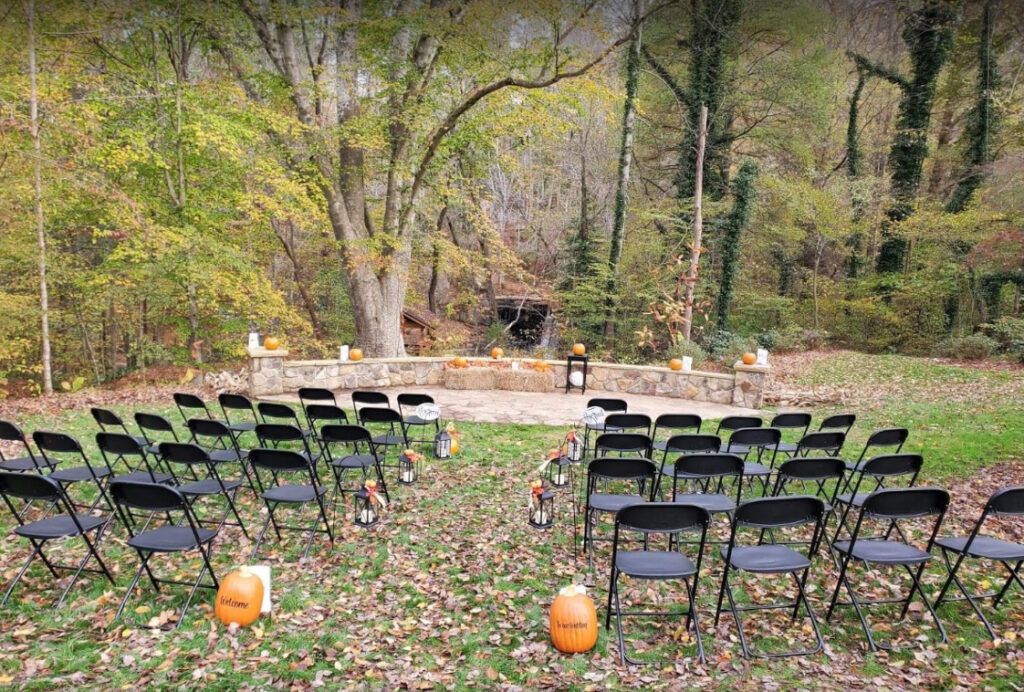 A view of a the Overlook set up for a wedding with fall decor