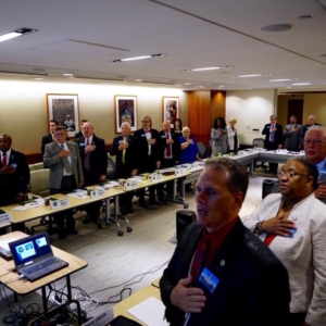 NCACC Board of Directors reciting the Pledge of Allegiance during the opening of their meeting at the National Association of Counties (NACo) Headquarters