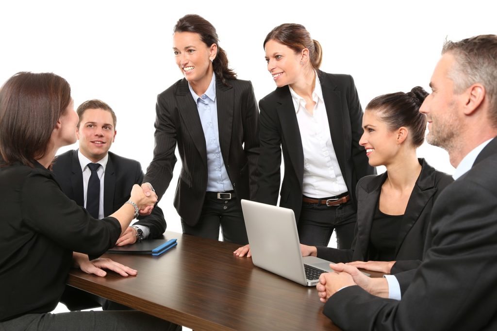 People Doing Business Around a Table